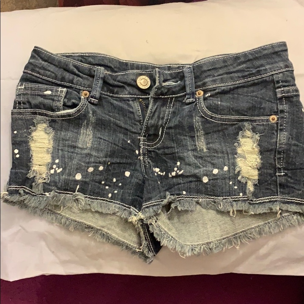 Paint splattered jean shorts